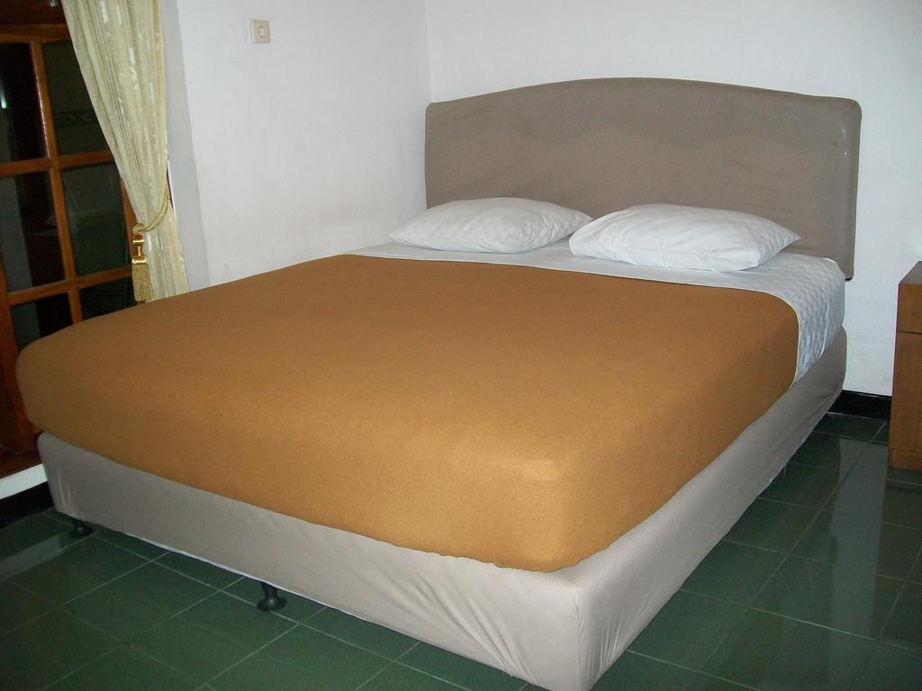 Krowi Inn Sorabaya Chambre photo