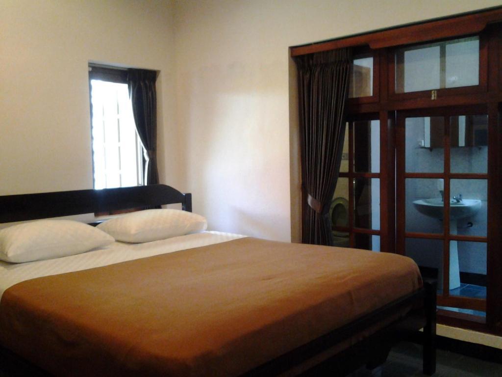Krowi Inn Sorabaya Extérieur photo